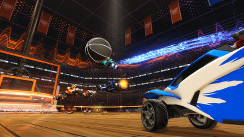 The 'Hoops' mode in Rocket League, one of the many updates to the game after its release, has players shoot the ball into a basket instead of a goal - Photo CC BY-SA
