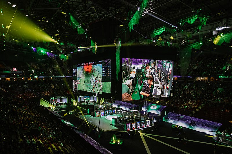 The largest Dota 2 tournaments often have prize pools totaling millions of dollars. Shown here is The International 2018, a $25 million tournament hosted at the Rogers Arena in Vancouver., tags: singapore host 2's - CC BY-SA